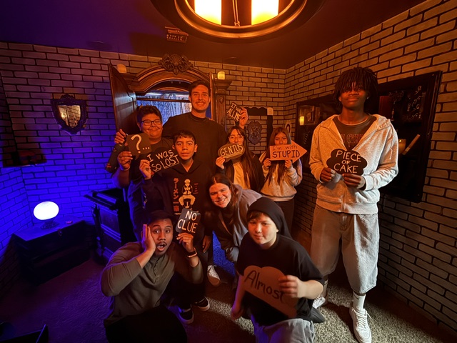 Greatest Escape guests celebrating after their escape room adventure